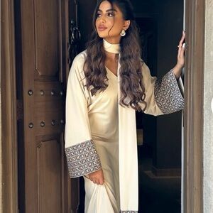Elegant Cream Abaya with Patterned Sleeves